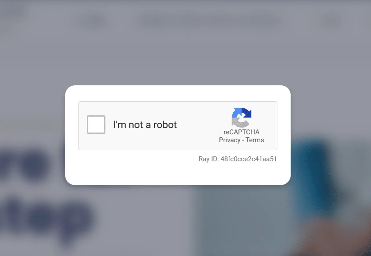 Browser screenshot showing fake Cloudflare human verification page on an infected site